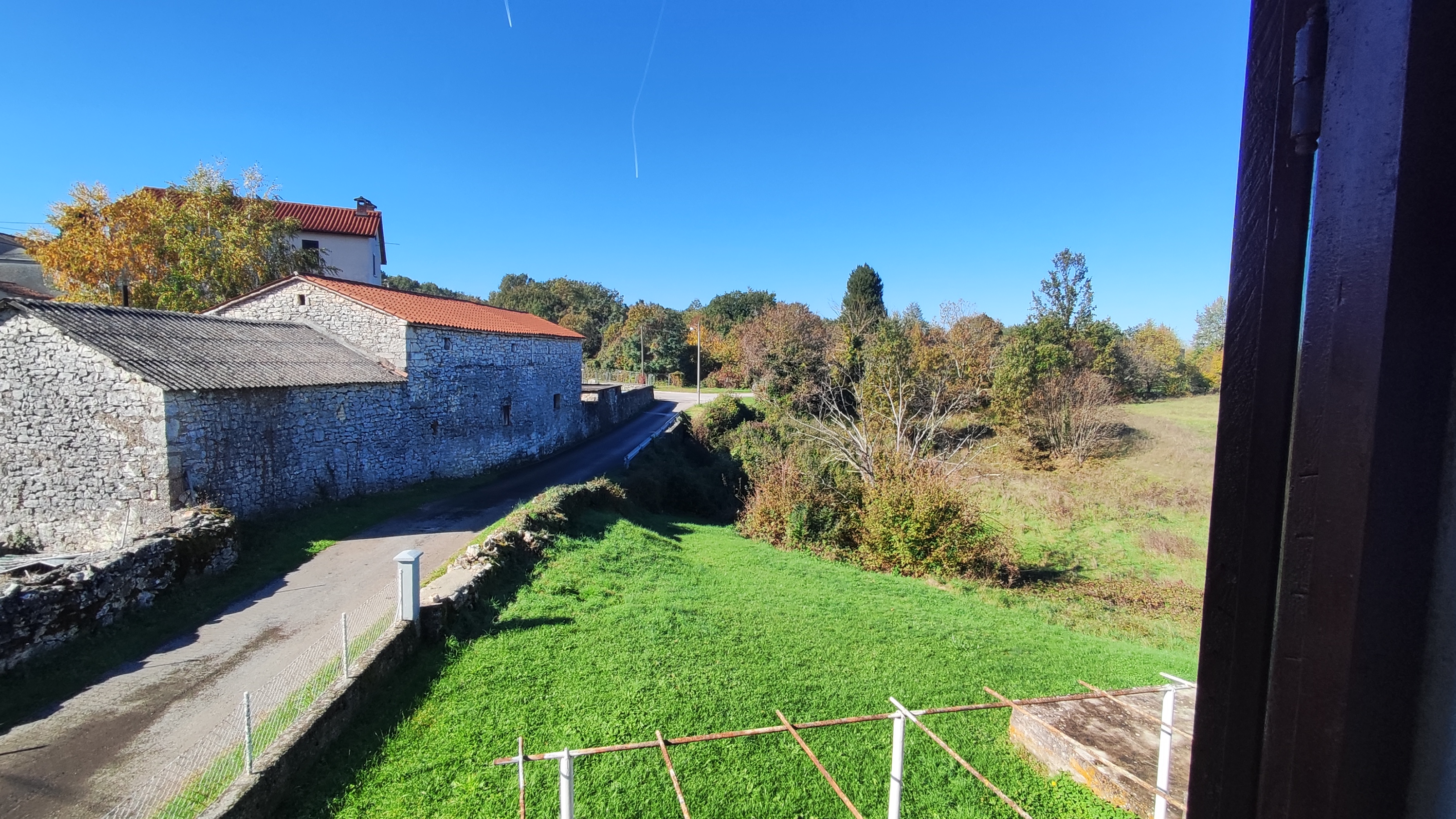View of fields and buildings from the property