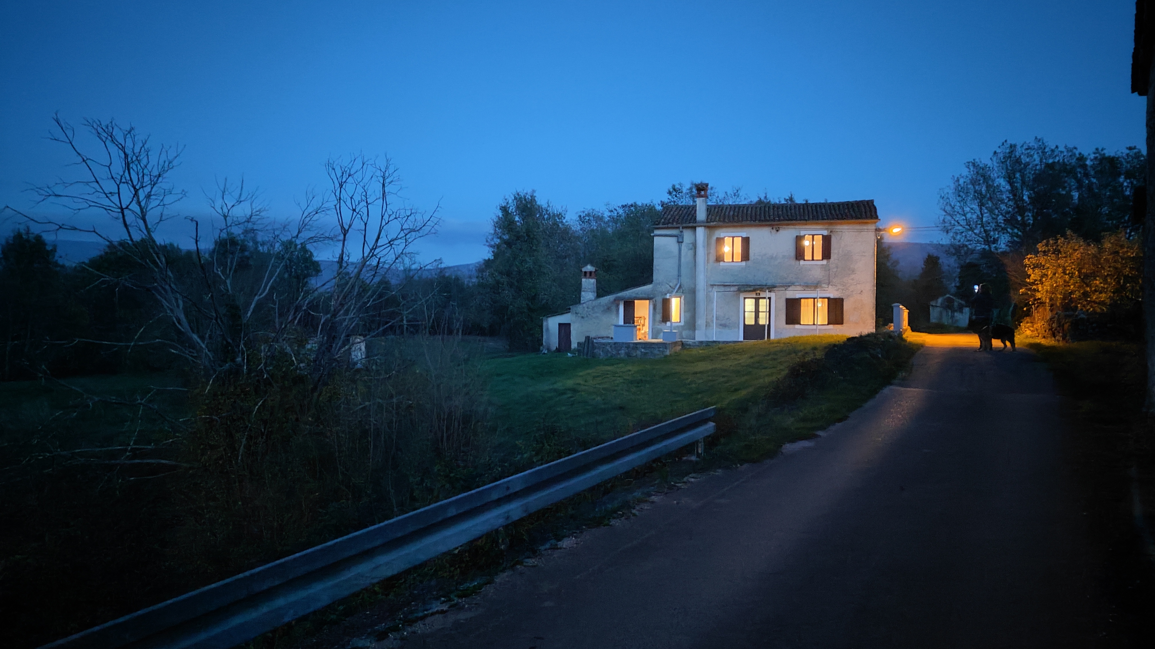 The house at twilight with warm lights